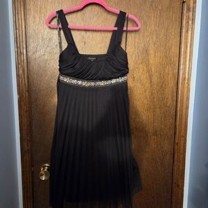Elegant Black Pleated Dress with Embellished Waist
